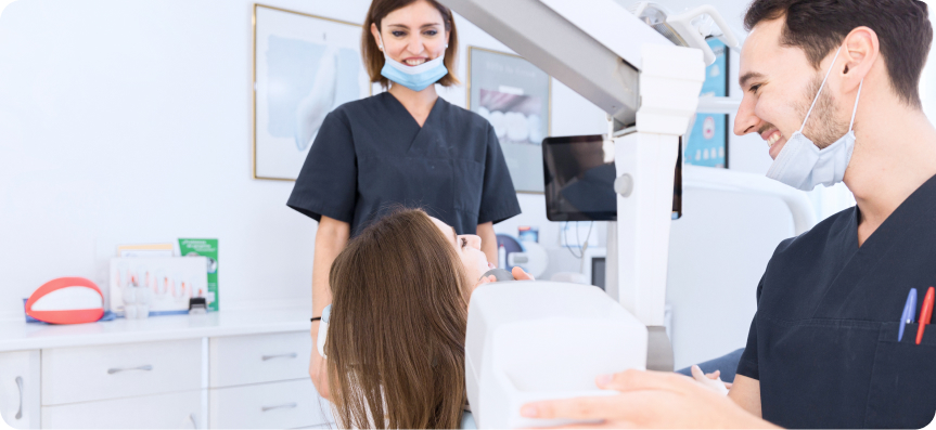 male-dentist-scanning-female-patient-s-teeth-with-x-ray-machine-1