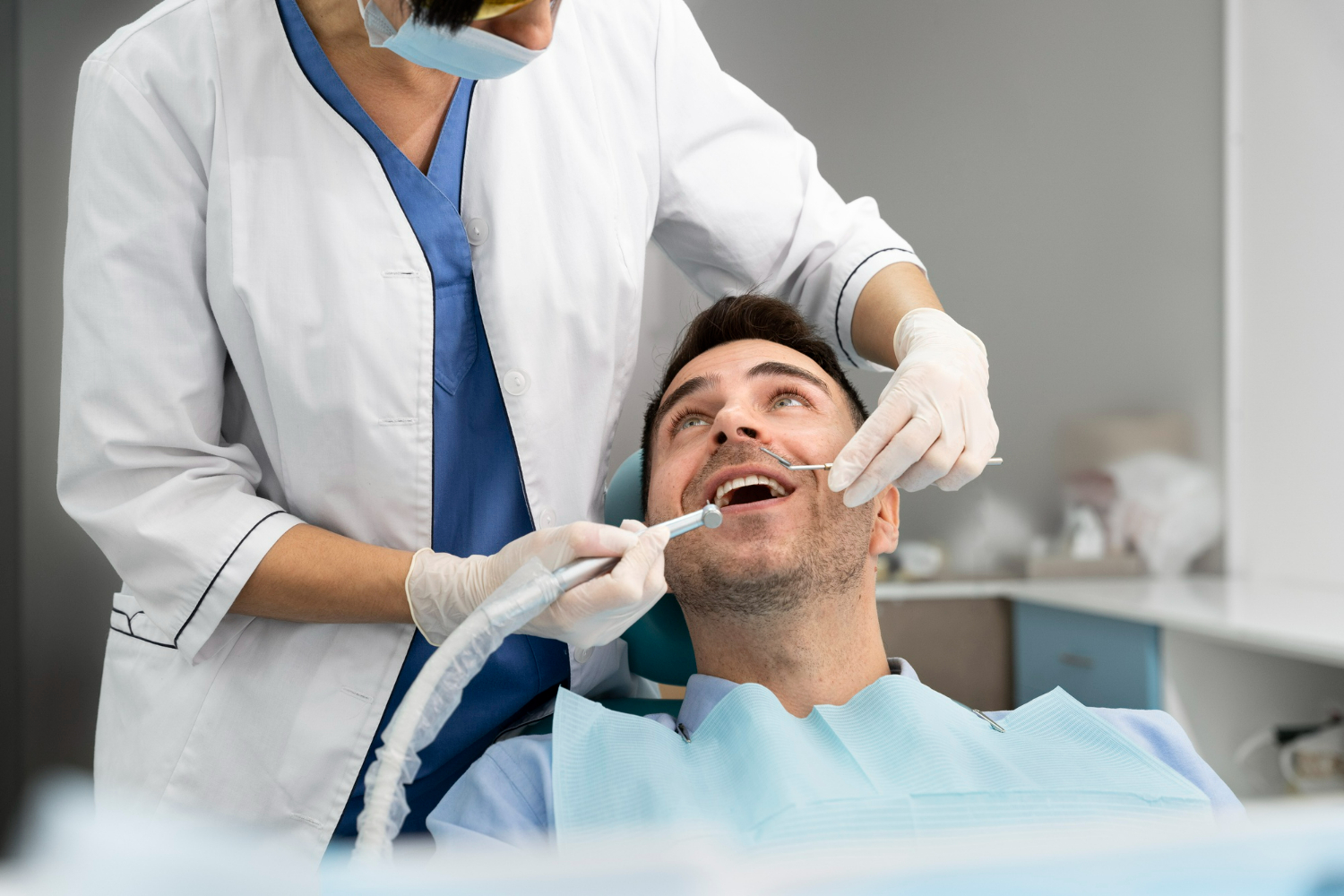 Patient smiling to his dentist