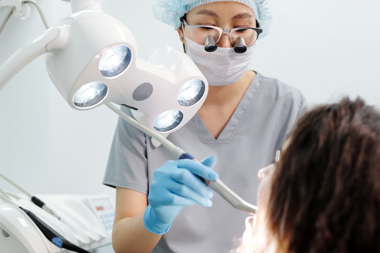 dental hygienist checking up their patient