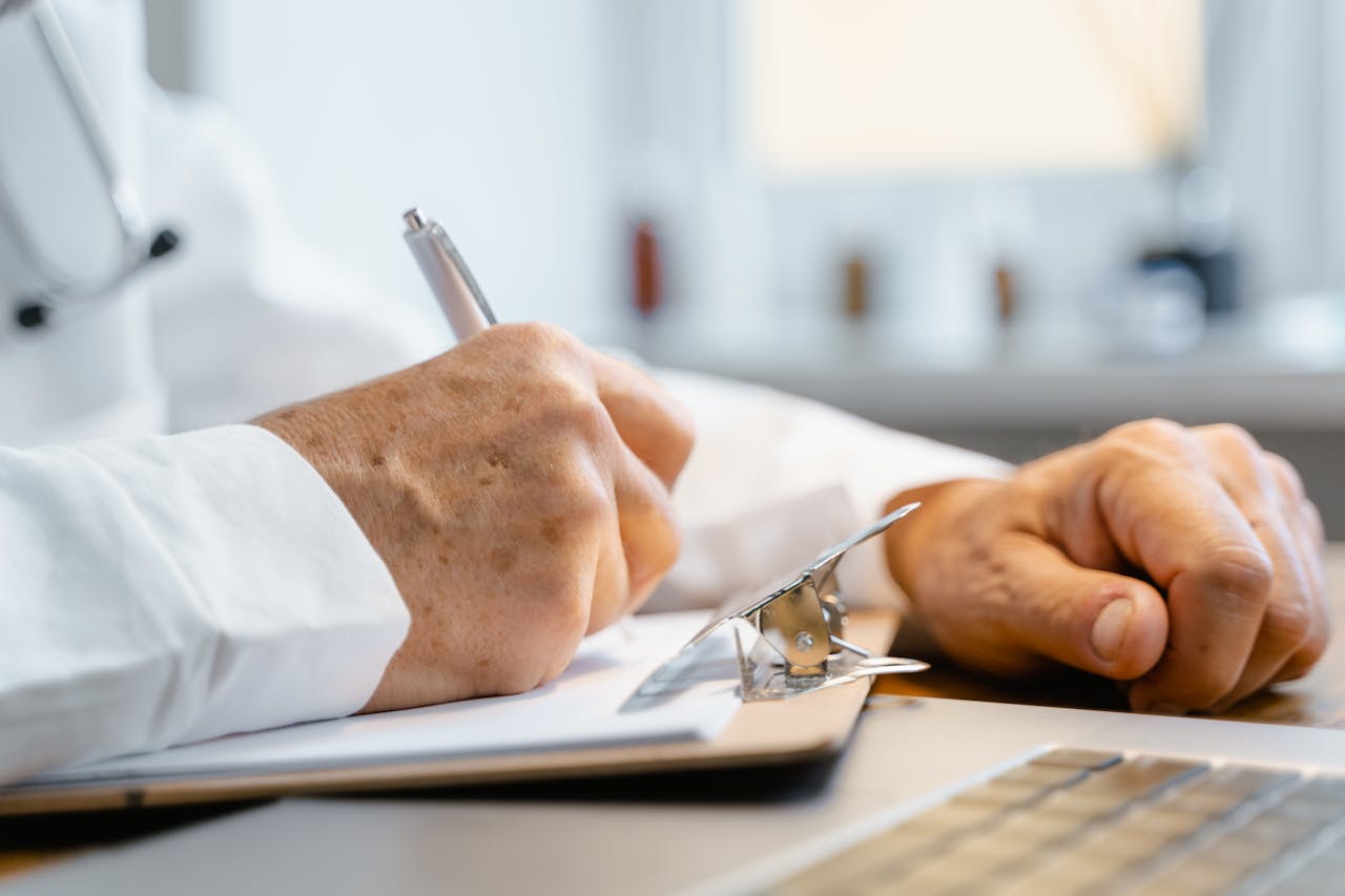 dentist writing on the notebook